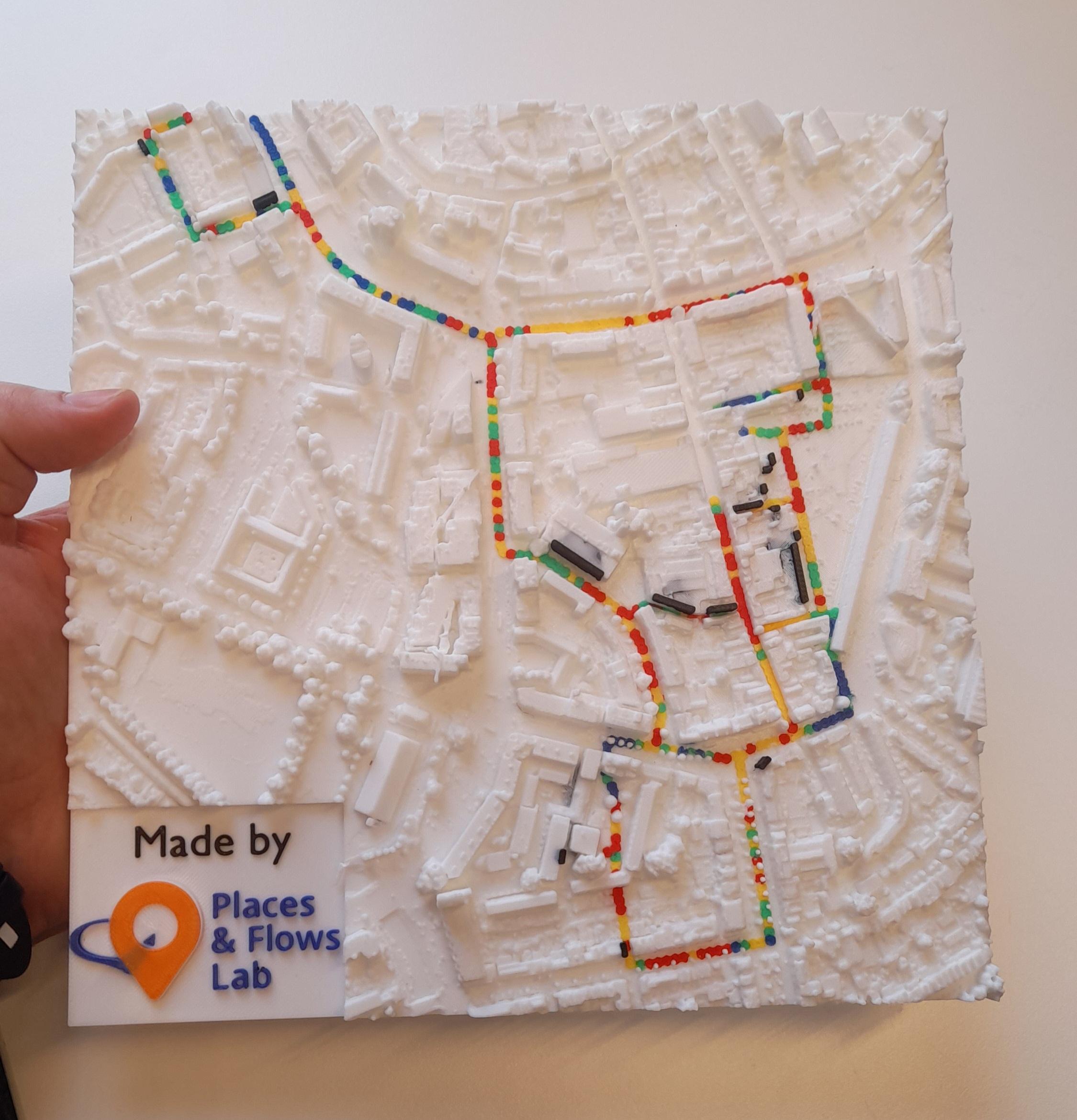 Holding the 3D-printed model of Breda city centre, with the tour route coloured by visitors’ emotional arousal