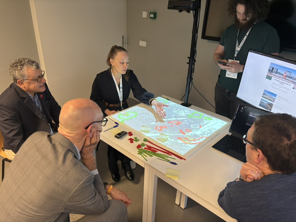 Participants discussing tourist flows during an overtourism workshop in Copenhagen