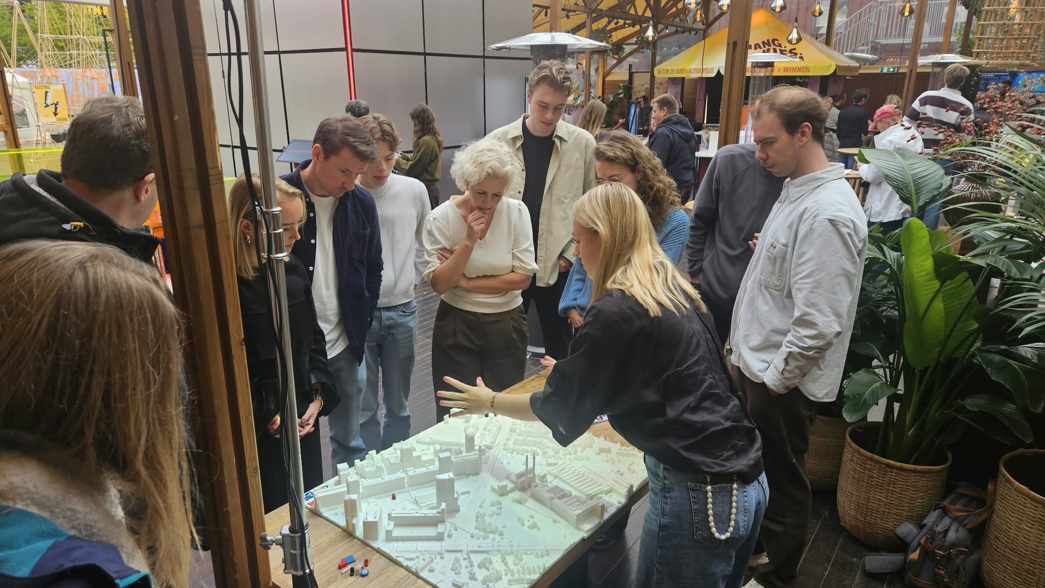 Visitors gathered around a 3D-printed model of Strijp-S at Dutch Design Week 2026